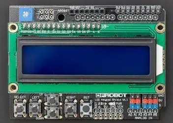 Fotografía de un LCD Keypad Shield: una placa verde con una pantalla LCD azul de dos filas en la parte superior, una fila de botones (SELECT, LEFT, UP, DOWN, RIGHT y RST) abajo a la izquierda, y un pequeño potenciómetro azul en la esquina superior izquierda.