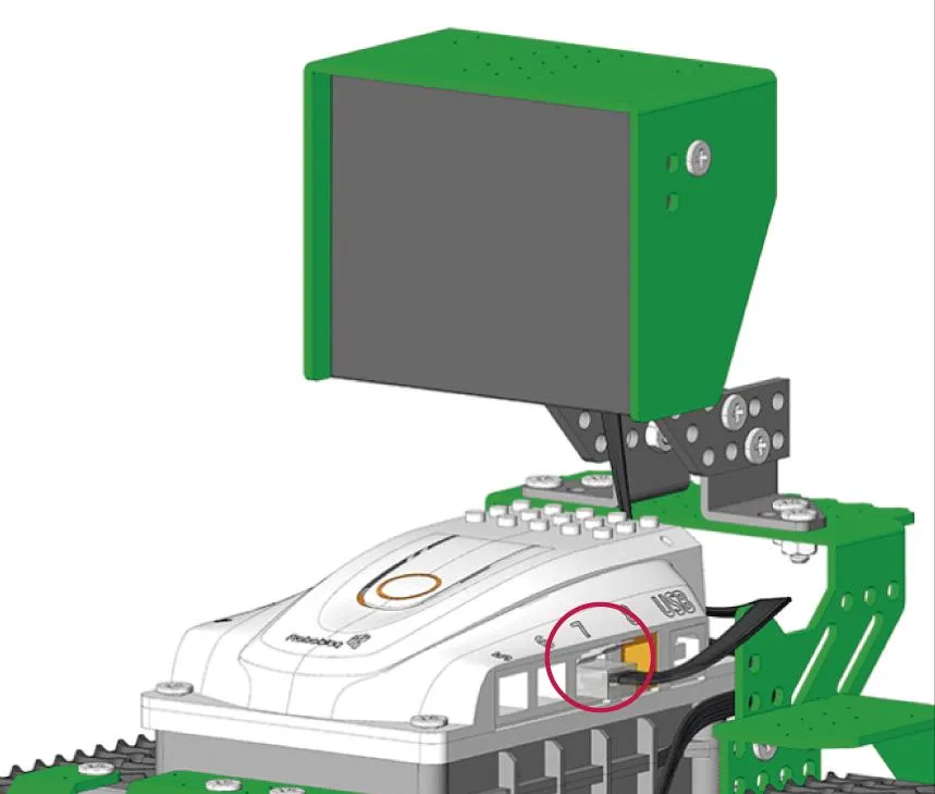 Display LED del kit montado sobre el robot y conectado con un cable al puerto de la placa; un círculo rojo destaca el puerto número 7 donde se enchufa el conector.